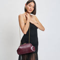 Calyra Clutch Bag
