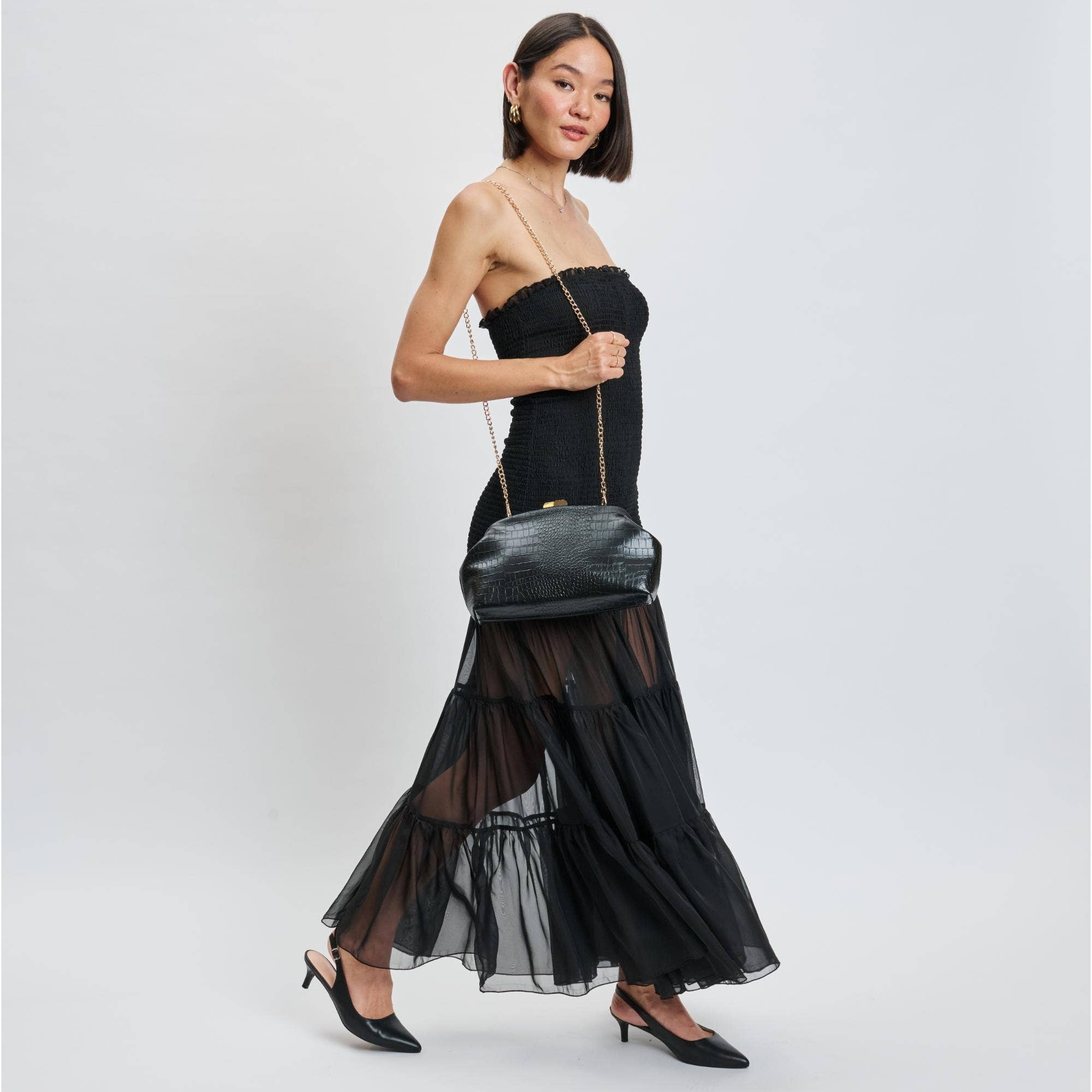 Calyra Clutch Bag