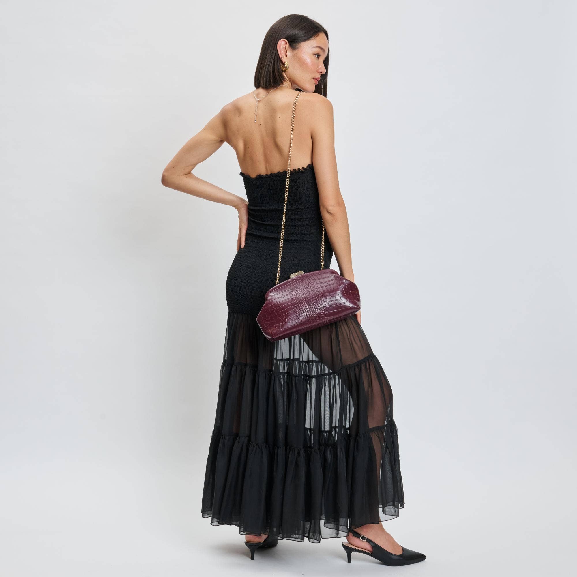 Calyra Clutch Bag